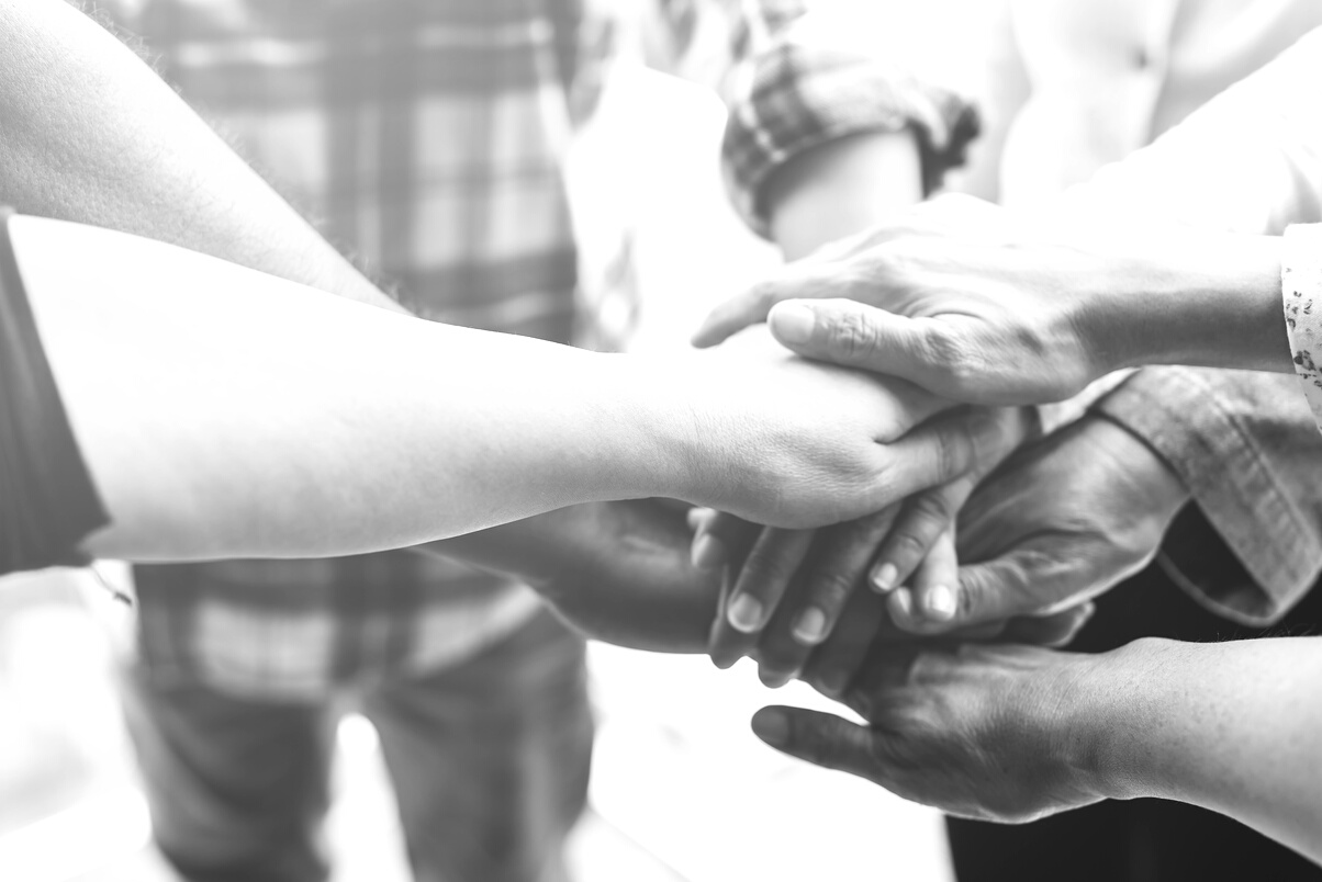 People hand assemble as a connection meeting teamwork concept. Group of people colleague assembly hands as a business or work achievement. Man and women touch each other hands. Teamwork conceptual.